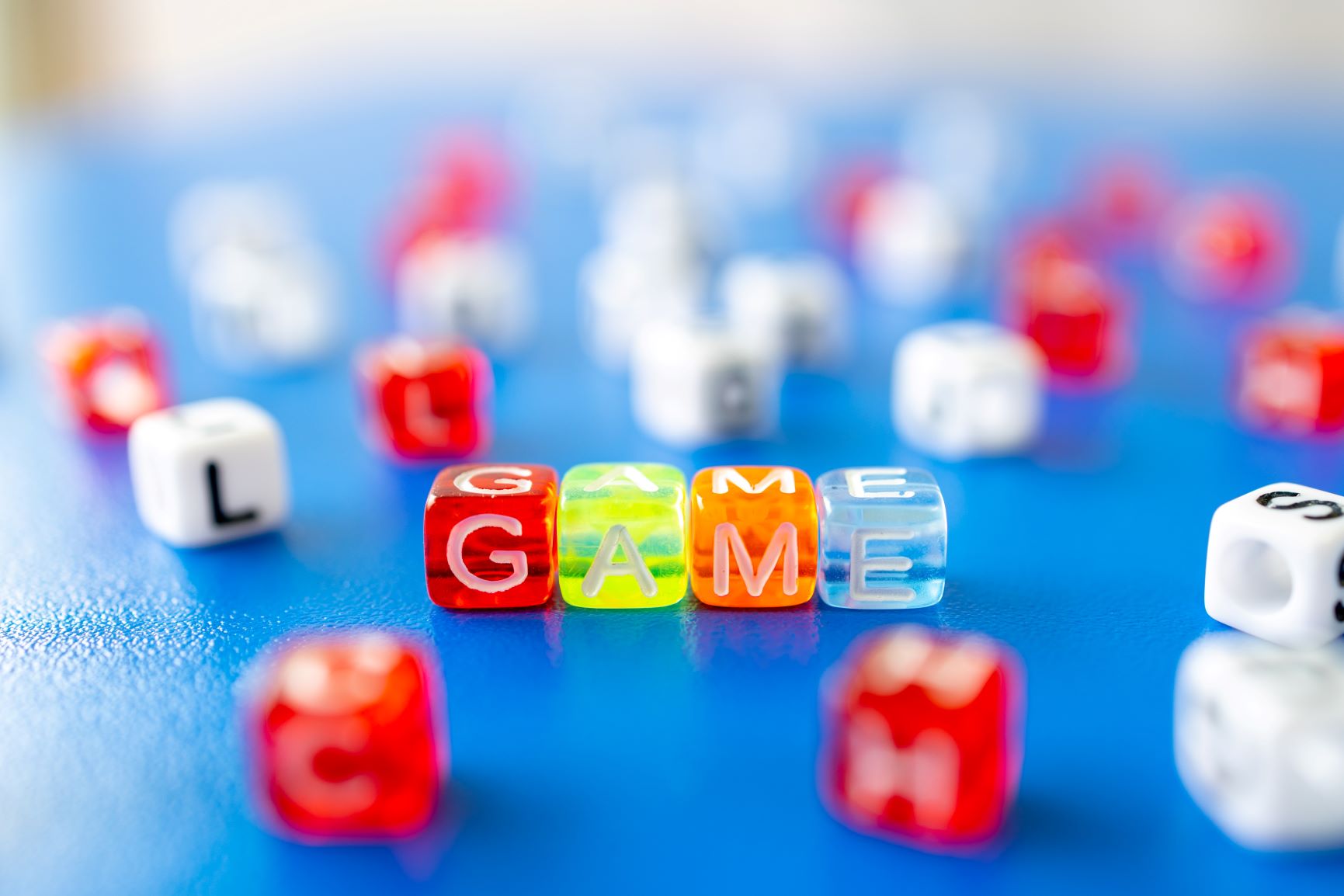 colourful beads spelling out "game"